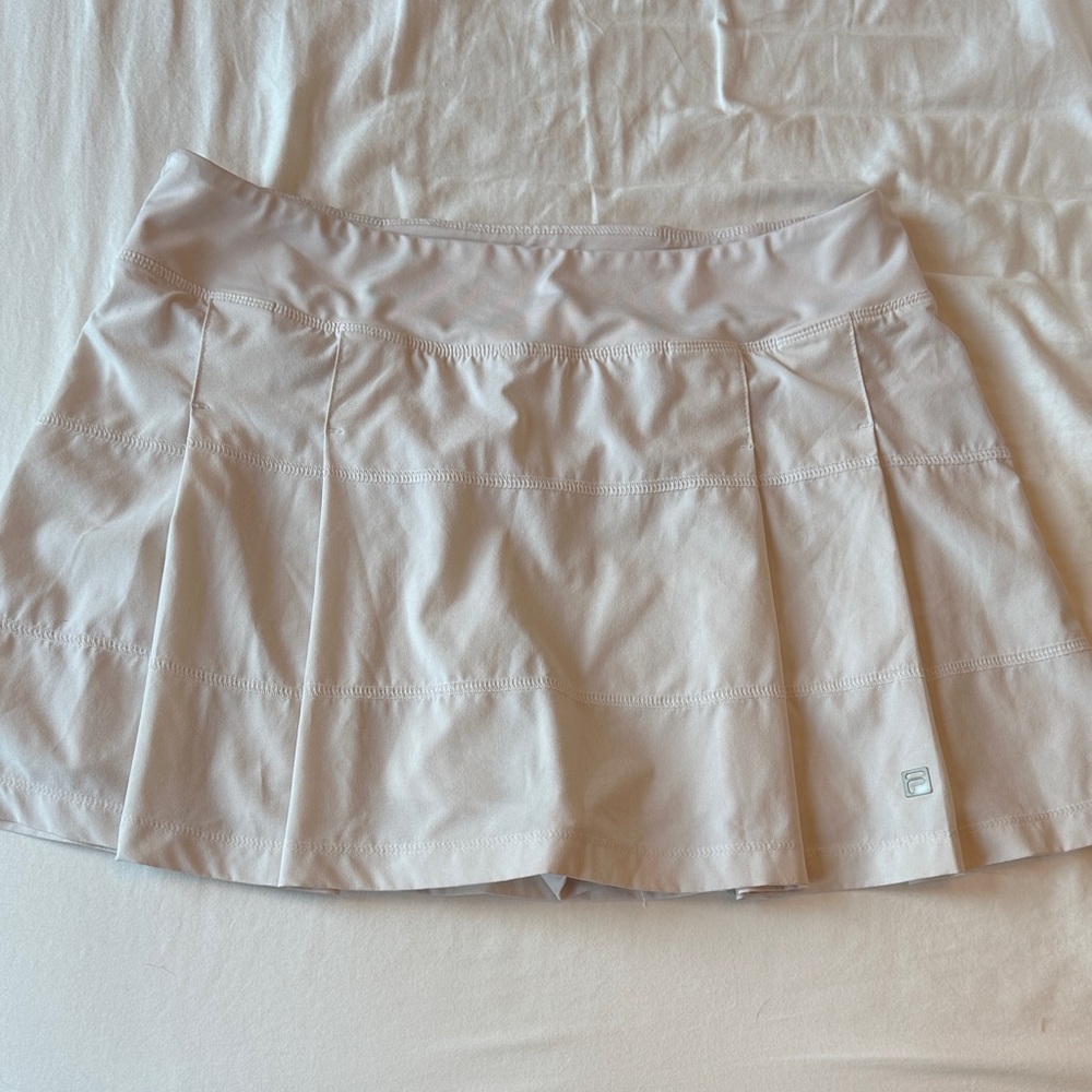 Fila Women's Cream Mini Skirt with bulit in shorts and back pocket with zipper